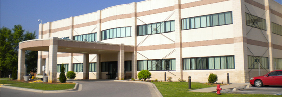 The front view of the Five Oaks Family Medical Clinic on a sunny, clear, blue sky day.